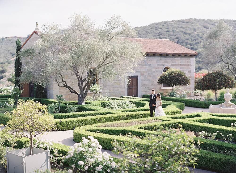 bride and groom in cal-a-vie garden | Jacqueline Benét
