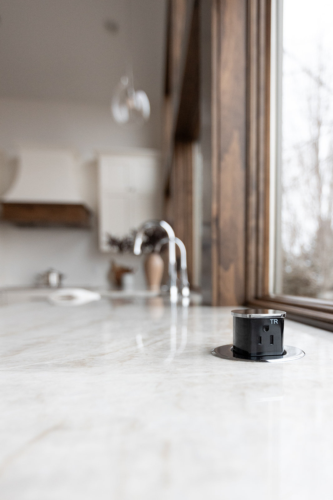 michele rosenboom design clean country renovation pop up socket in on kitchen island