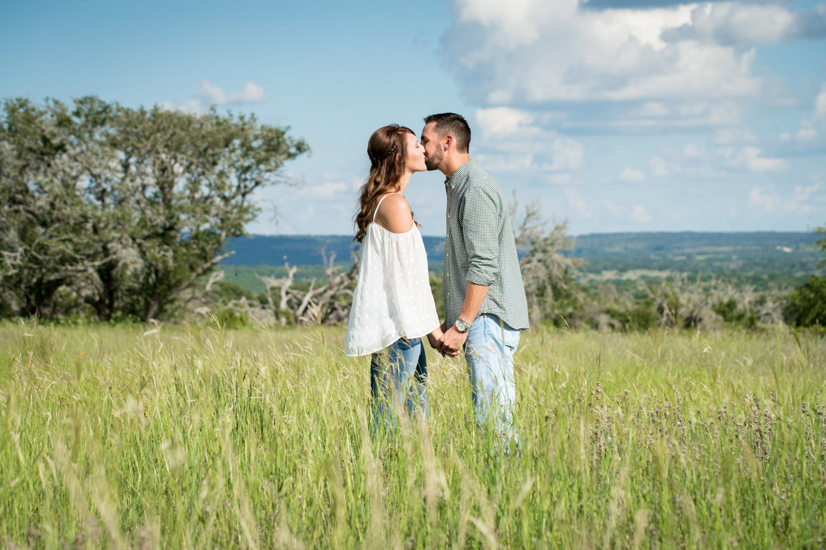 hill country engagement session austin wedding photographer kiss