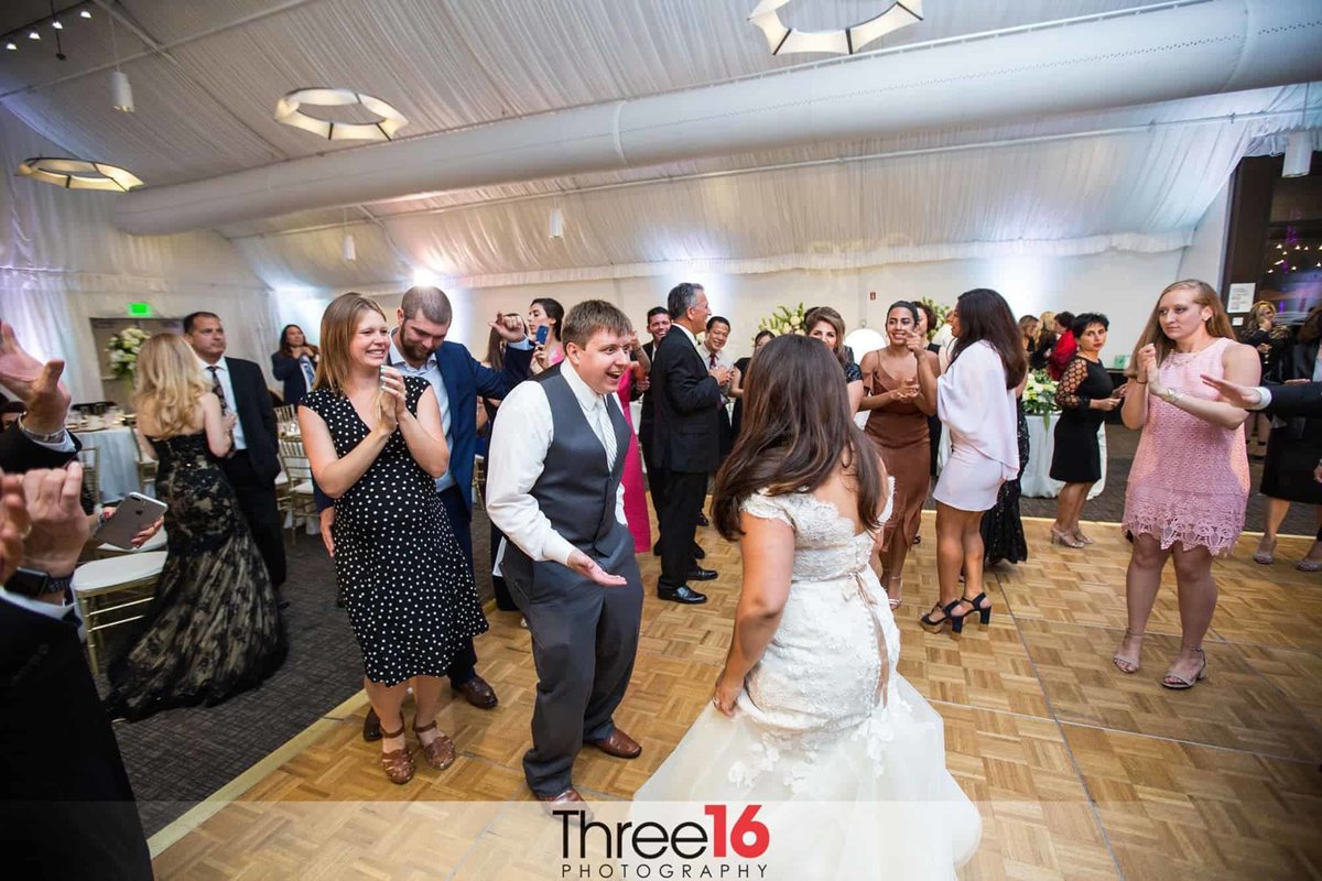 Bride and Groom dance together on the dance floor
