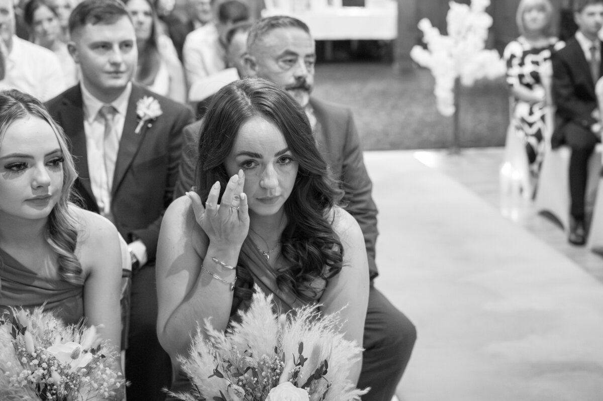 Candid emotional guest reactions during wedding at Worsley Court House - Carmen Sherred Photography Wedding Photographer 