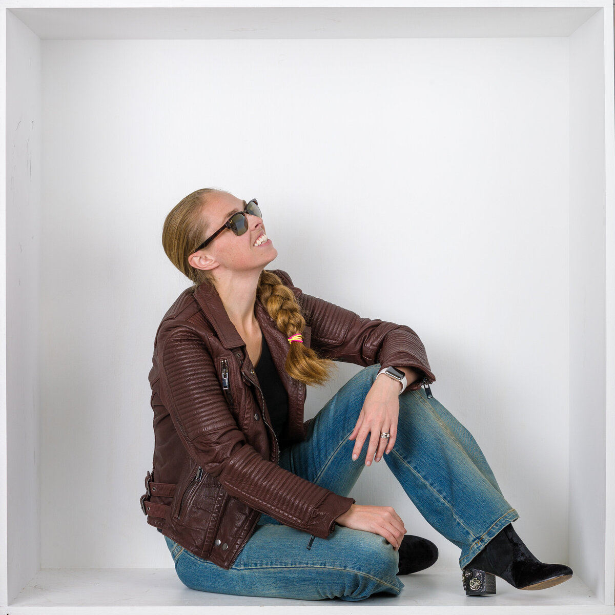Headshot and branding photographer Jen from Fox & Brazen in  a white box