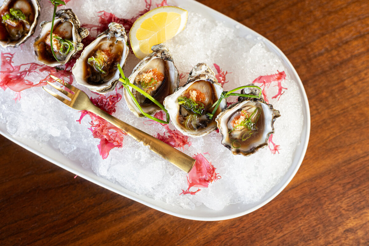 A plate of Oysters sits on a table at Sushi Row in Colorado Springs.