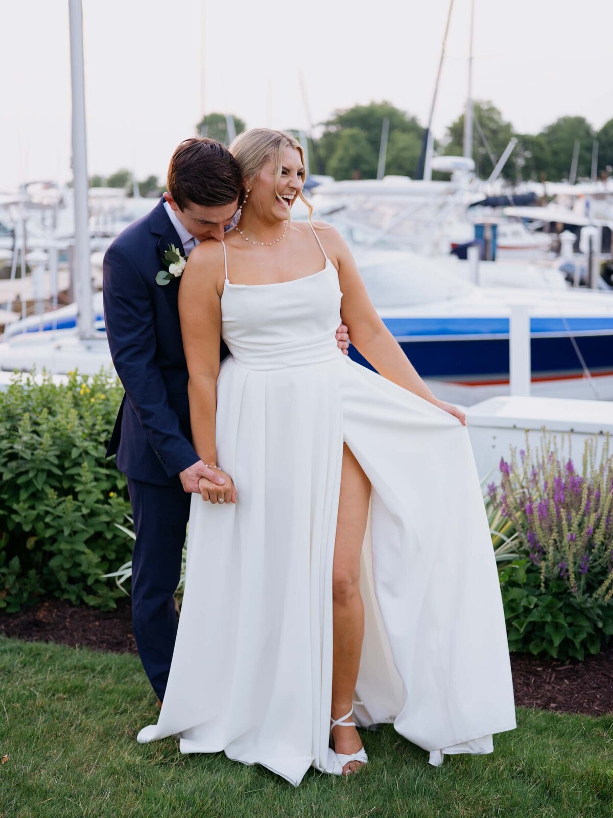 Bride and groom sunset photo by the dock at Cleveland Yachting Club