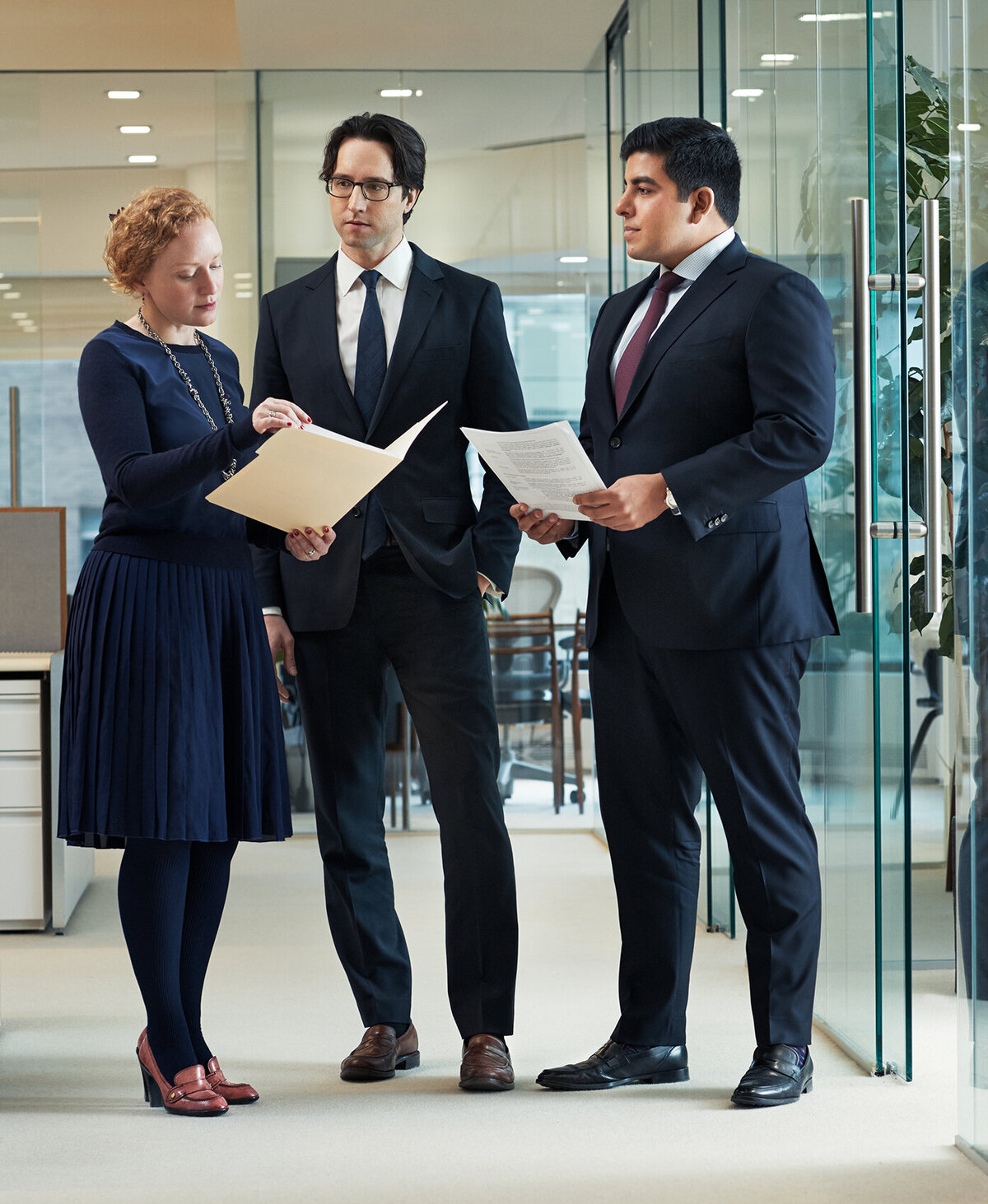 Formal portrait of the executive team at Cornell Capital Offices, captured by Ylva Erevall.
