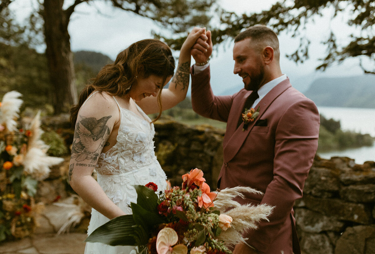 XO Social Haus Wedding Planner Oregon Destination Pacific Northwest Wedding Planners Event Planners Wedding Planning Stephanie Laur Seattle Wedding Venues Venue Couple Walking Hand in Hand at The Griffin House