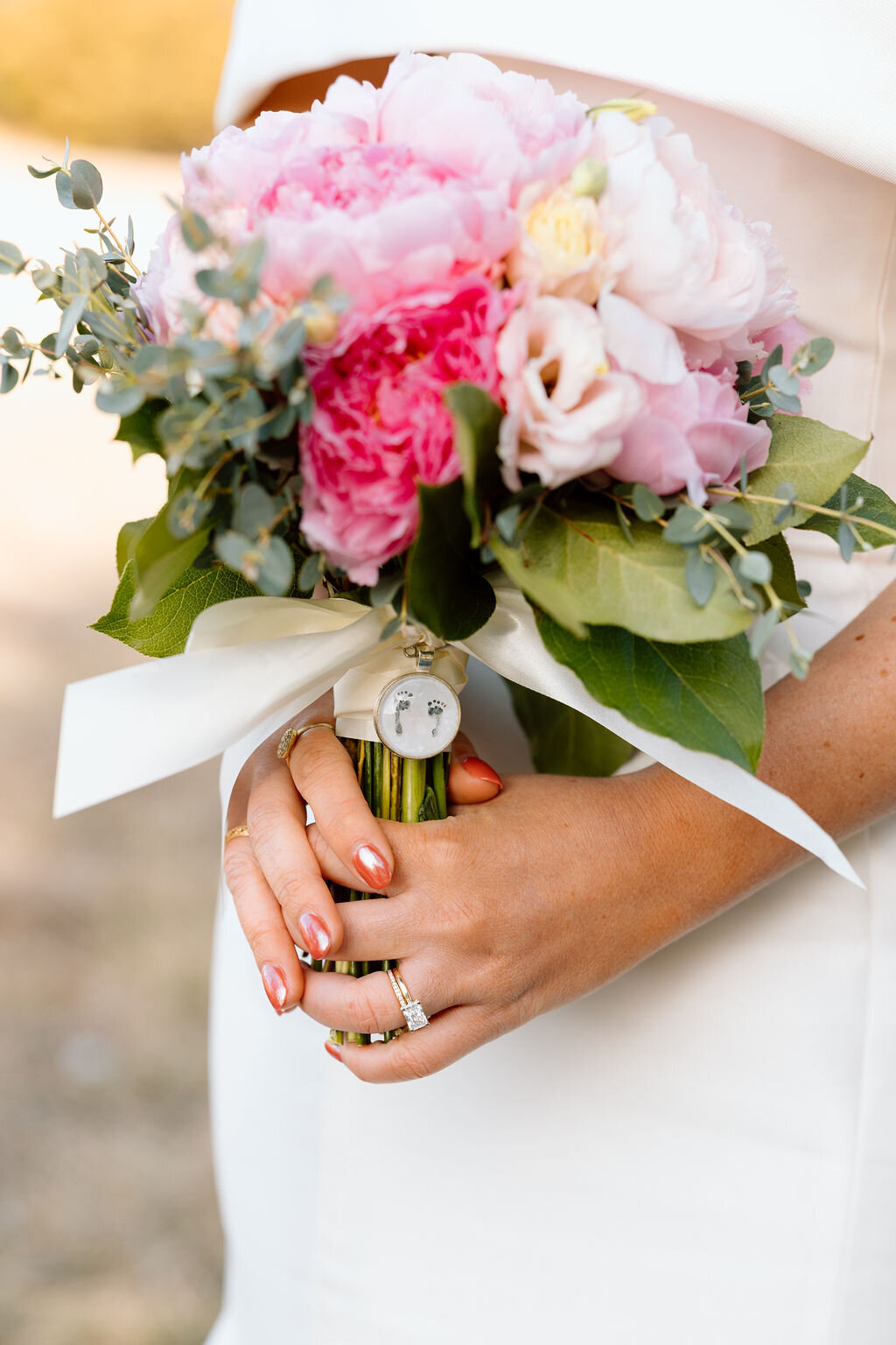 bride holds florals at wedding in kansas city
