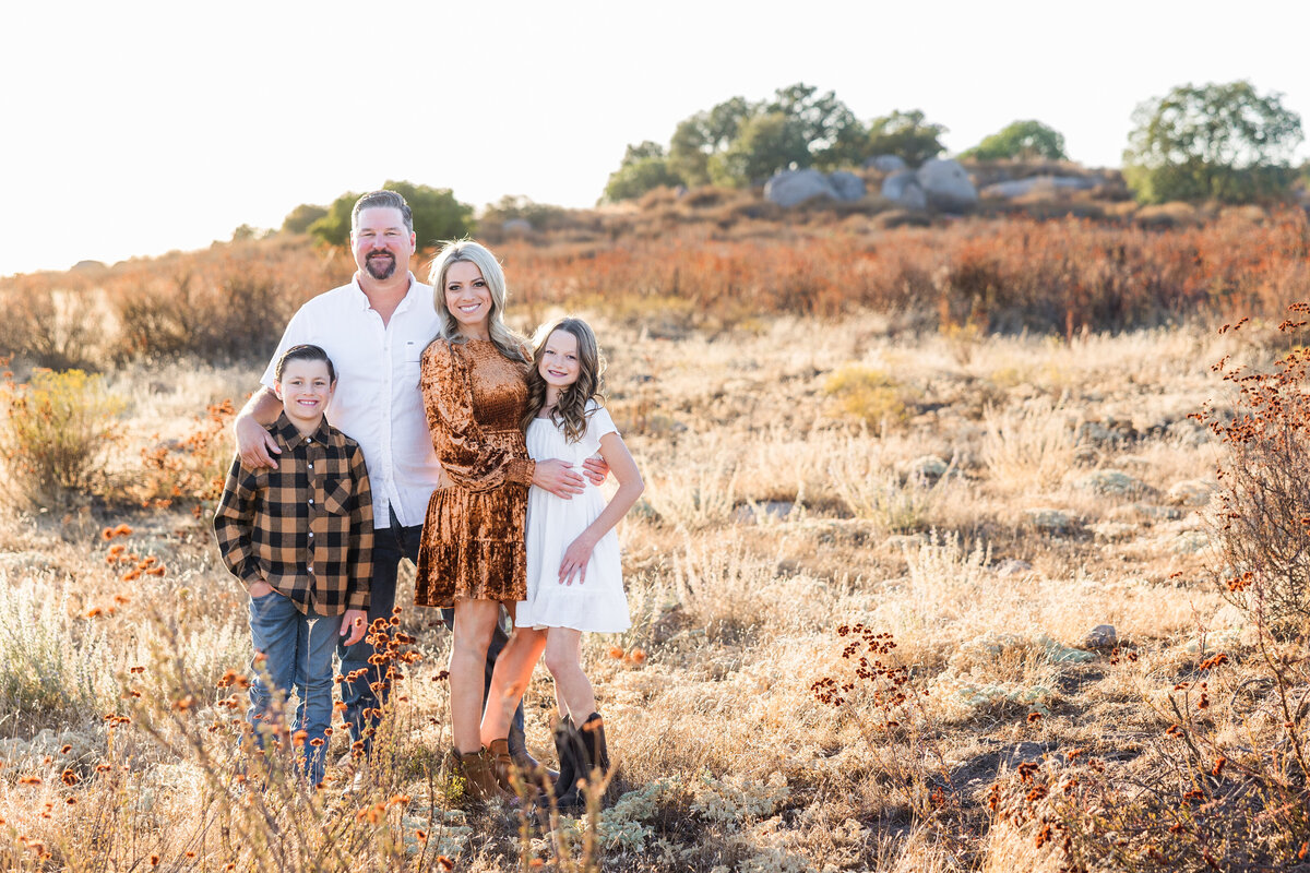 family standing in wrights field san diego