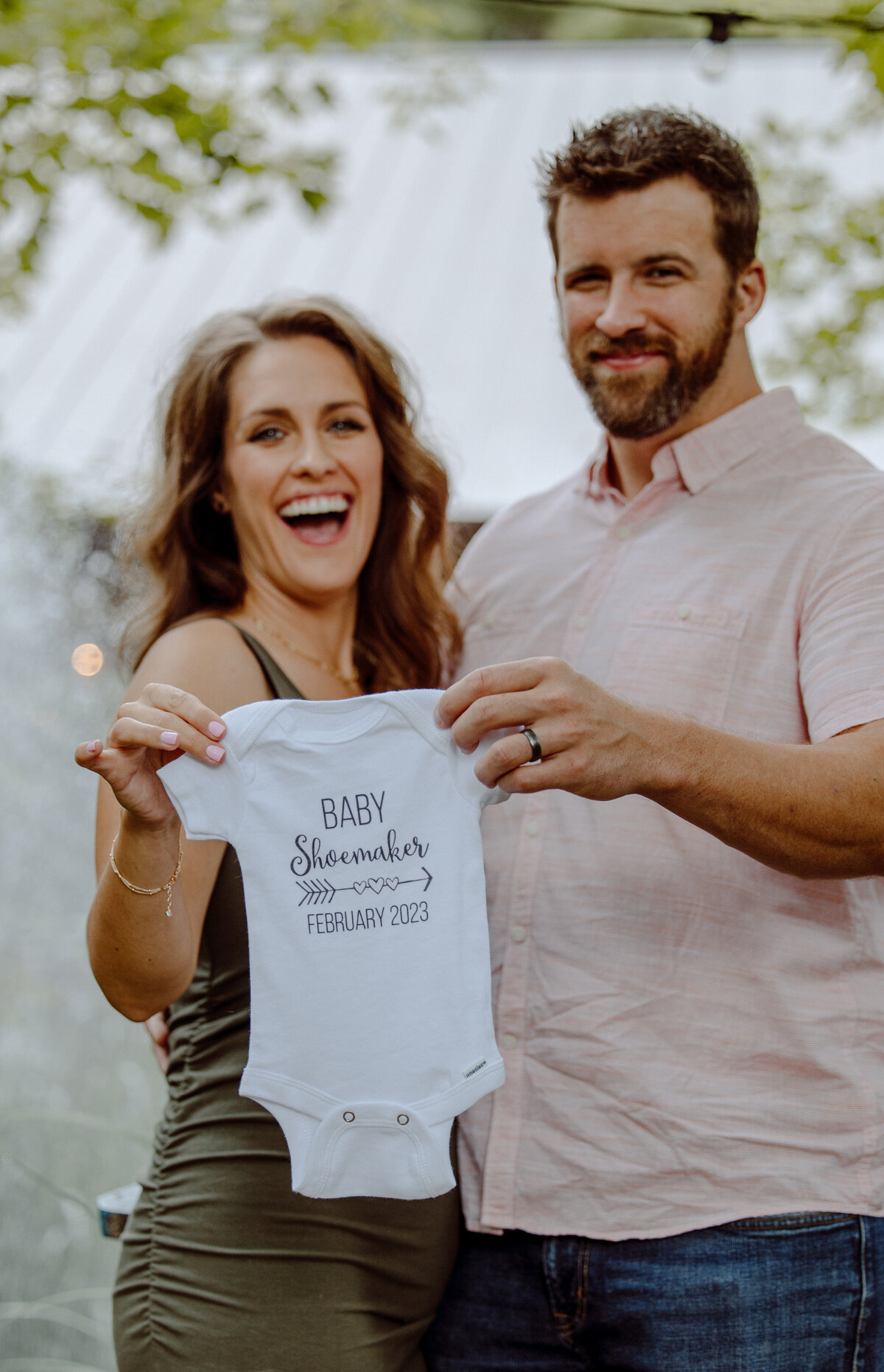 Katie and Owen Anniversary Photos and Baby Reveal at Blue Bridge Traverse City Michigan by Madi Taylor Photo-1