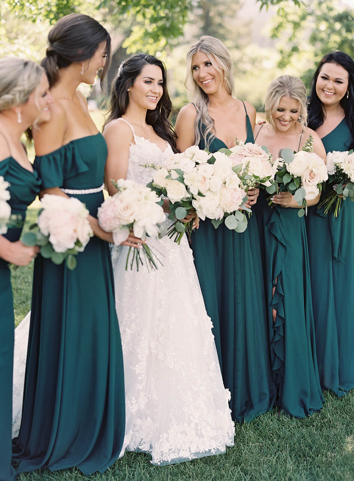 Bride and bridal party at a timeless blush wedding in Boulder Colorado