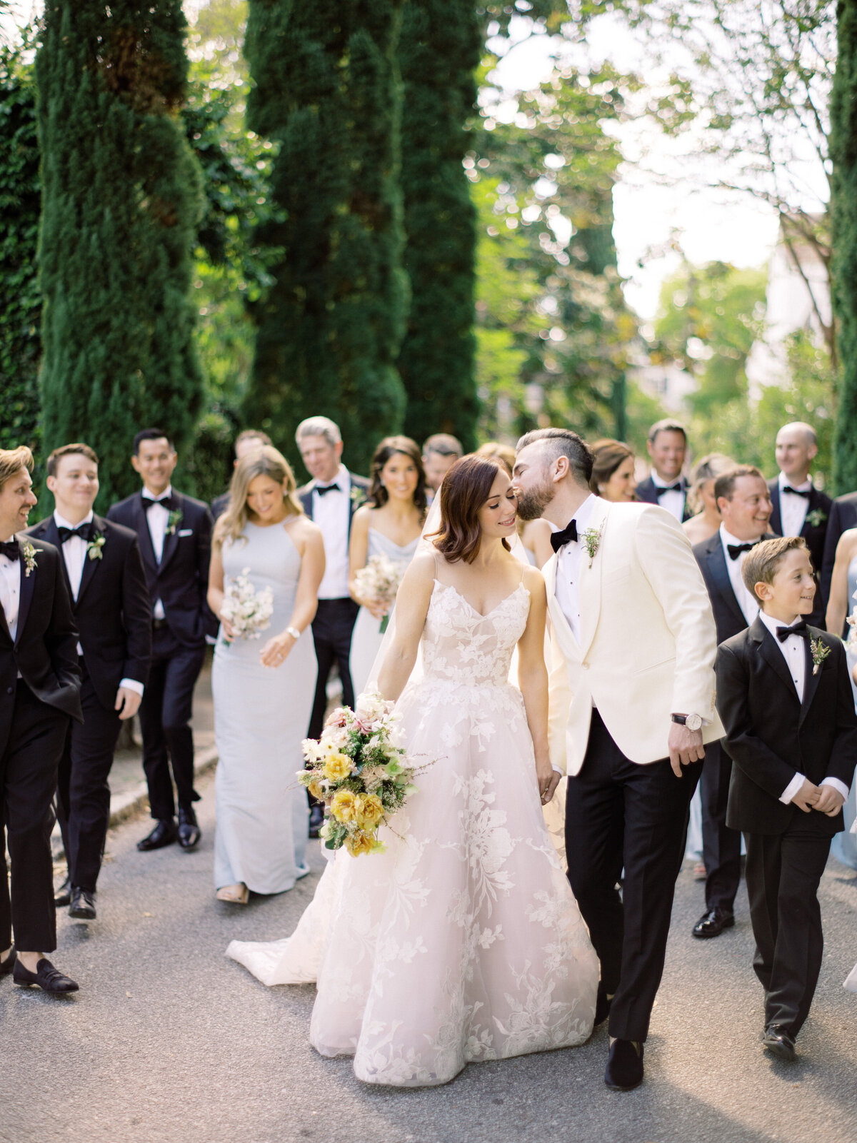 Wedding Party walking in Historic Charleston, SC. Photo by Philip Casey.