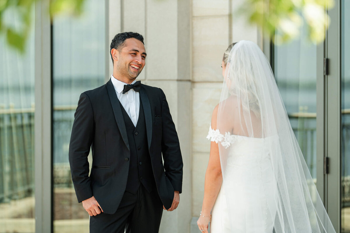 Bride and Groom first look at The Edgewater Hotel wedding in Madison,  WI