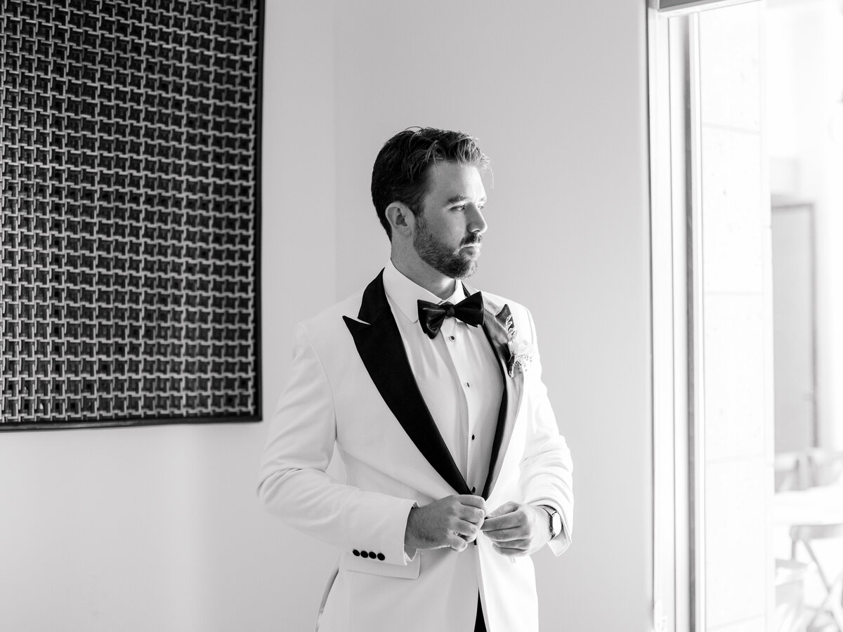groom-getting-ready-photo-black-tie-bougainvilla-estate-wedding-indio.jpg