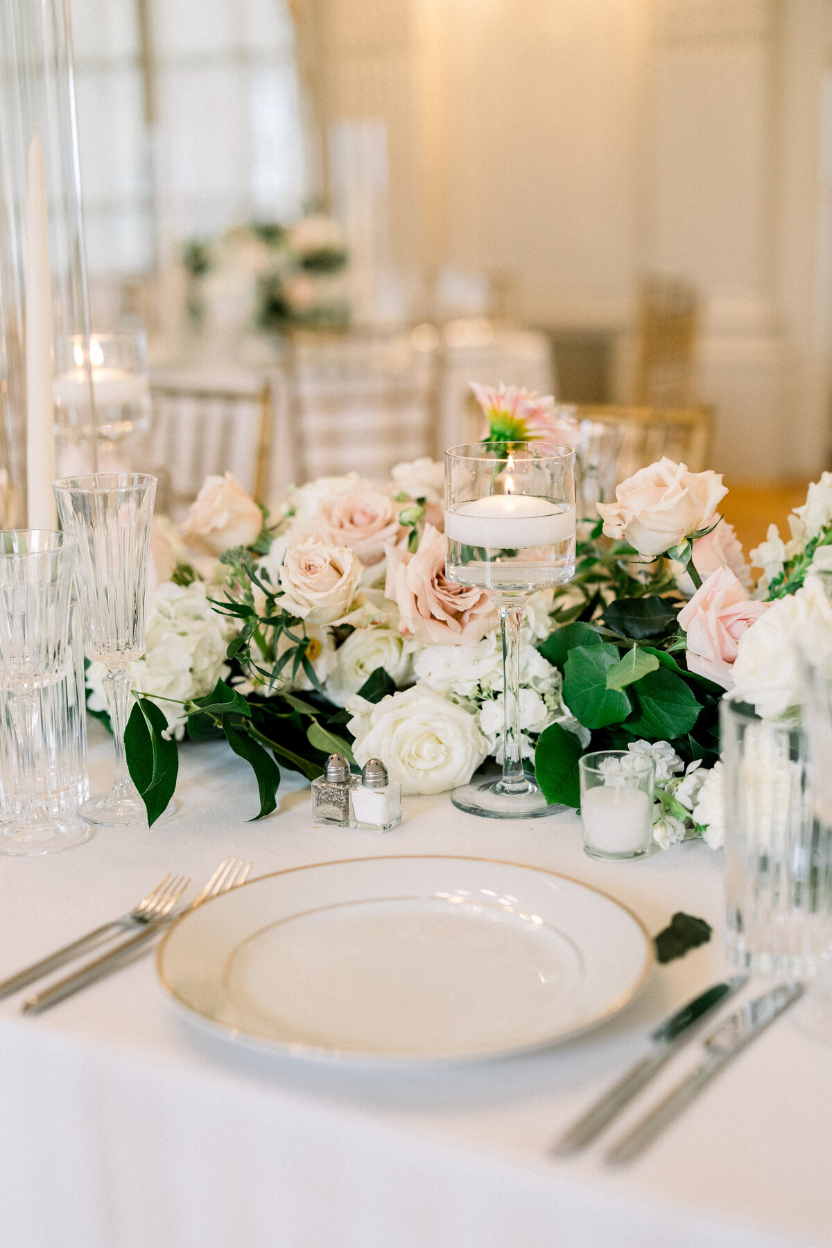elegant place settings  in silver and white at rosecliff mansion in newport rhode island