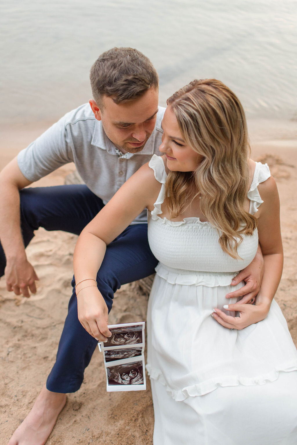Couple making a pregnancy announcement maternity photo session in Lake Norman