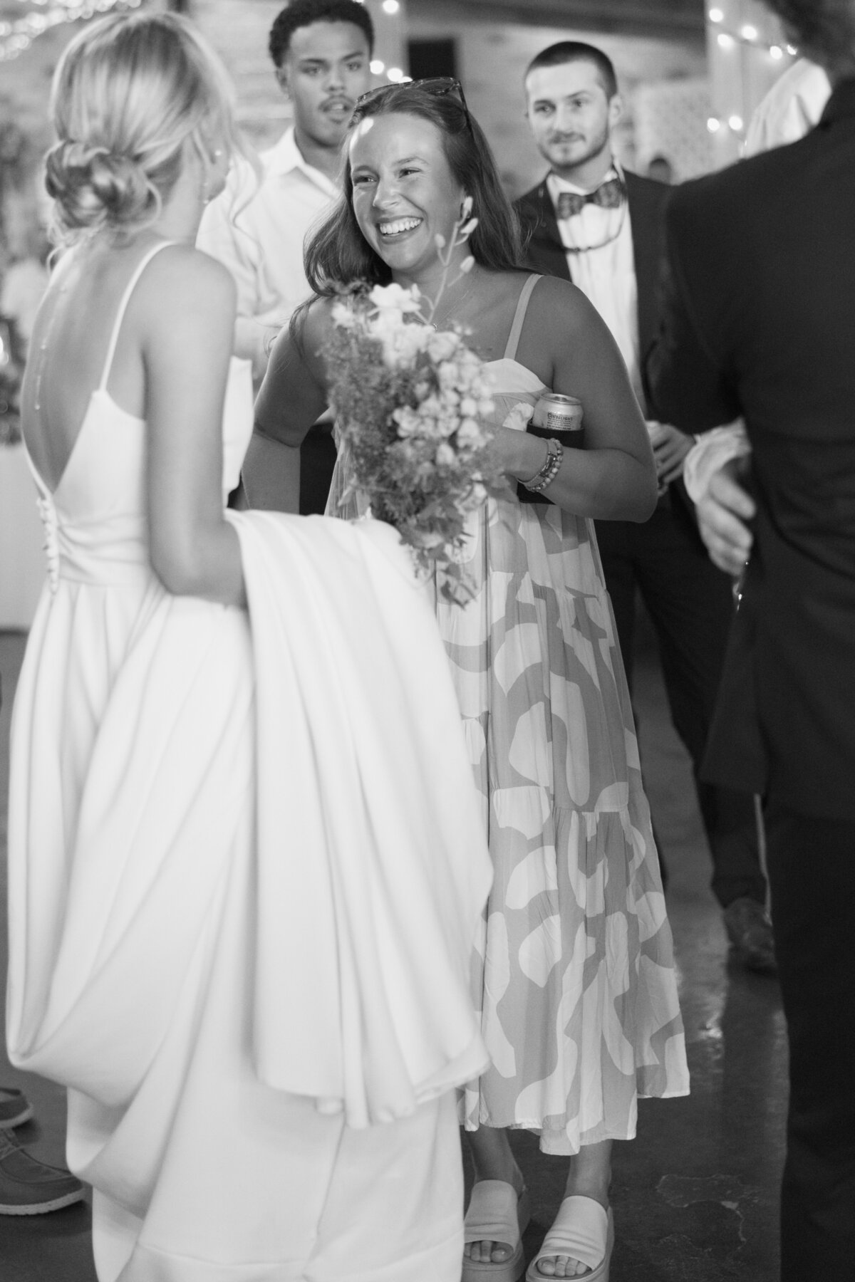 Bride interacts with guests