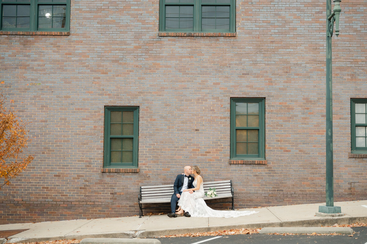 Bride and groom walking hand in hand laughing, taken by Asheville Wedding Photographer Simon Anthony Photography