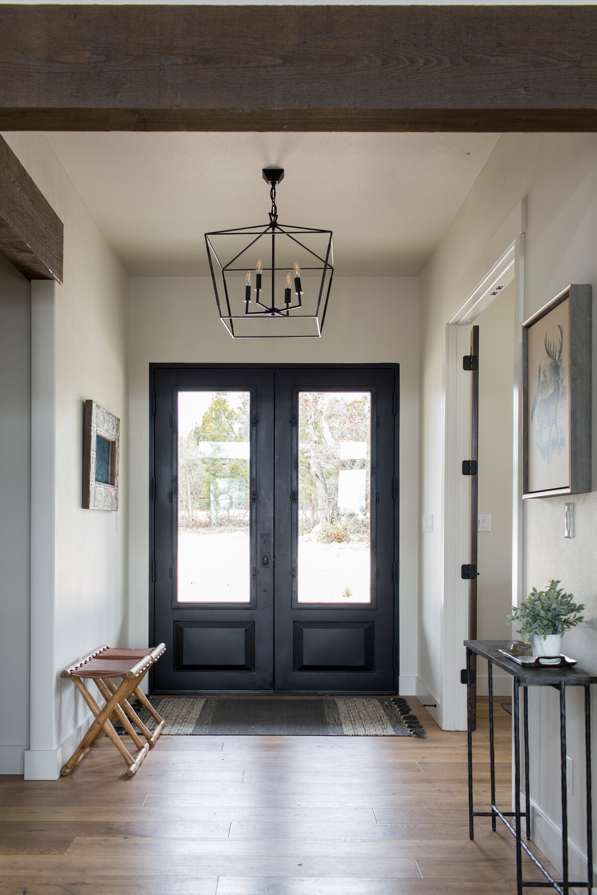 black doors entryway to home