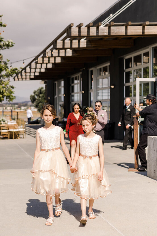 two-girls-walking-salt-drift-point-venue