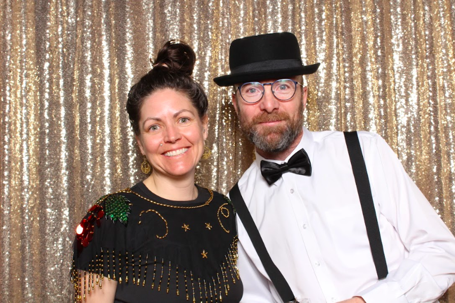 Couple-using-photo-booth-props-at-event-in-Vancouver