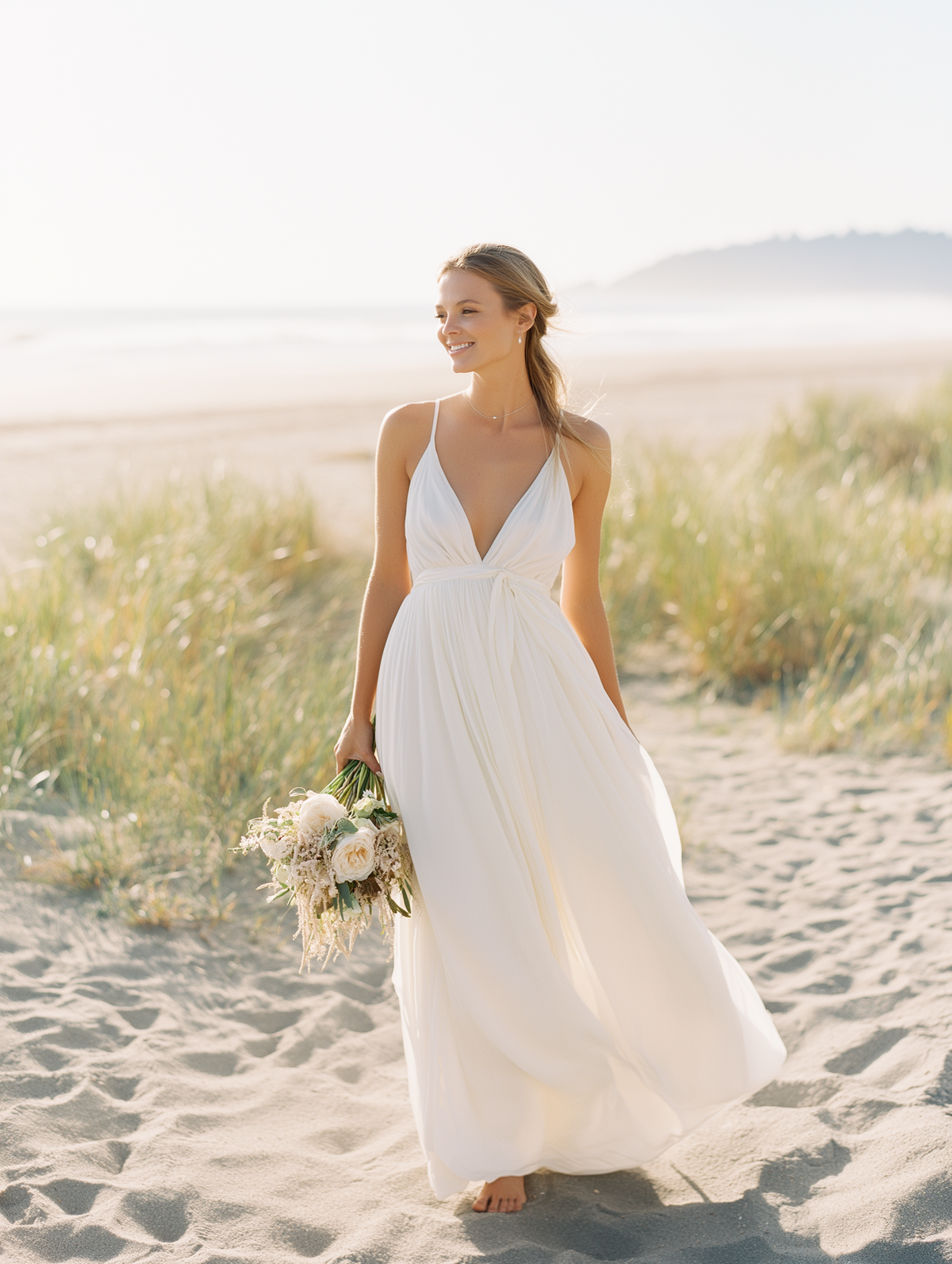 kdurski_86694_bride_wearing_simple_wedding_elopement_dress_on_b_4dabbde2-e005-4937-a018-e430989386c9