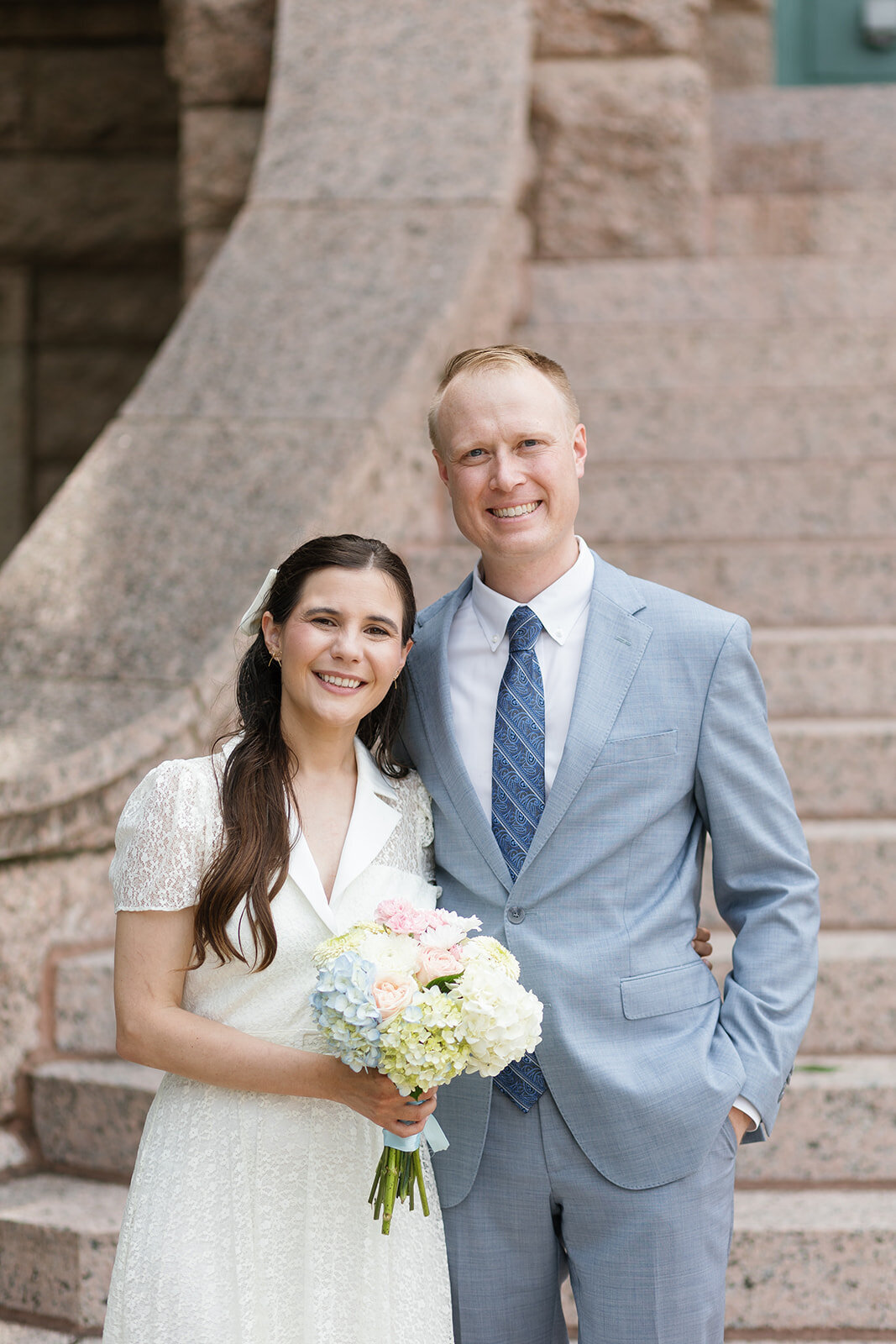 Portrait of Fort Worth couple outside courthouse after ceremony.