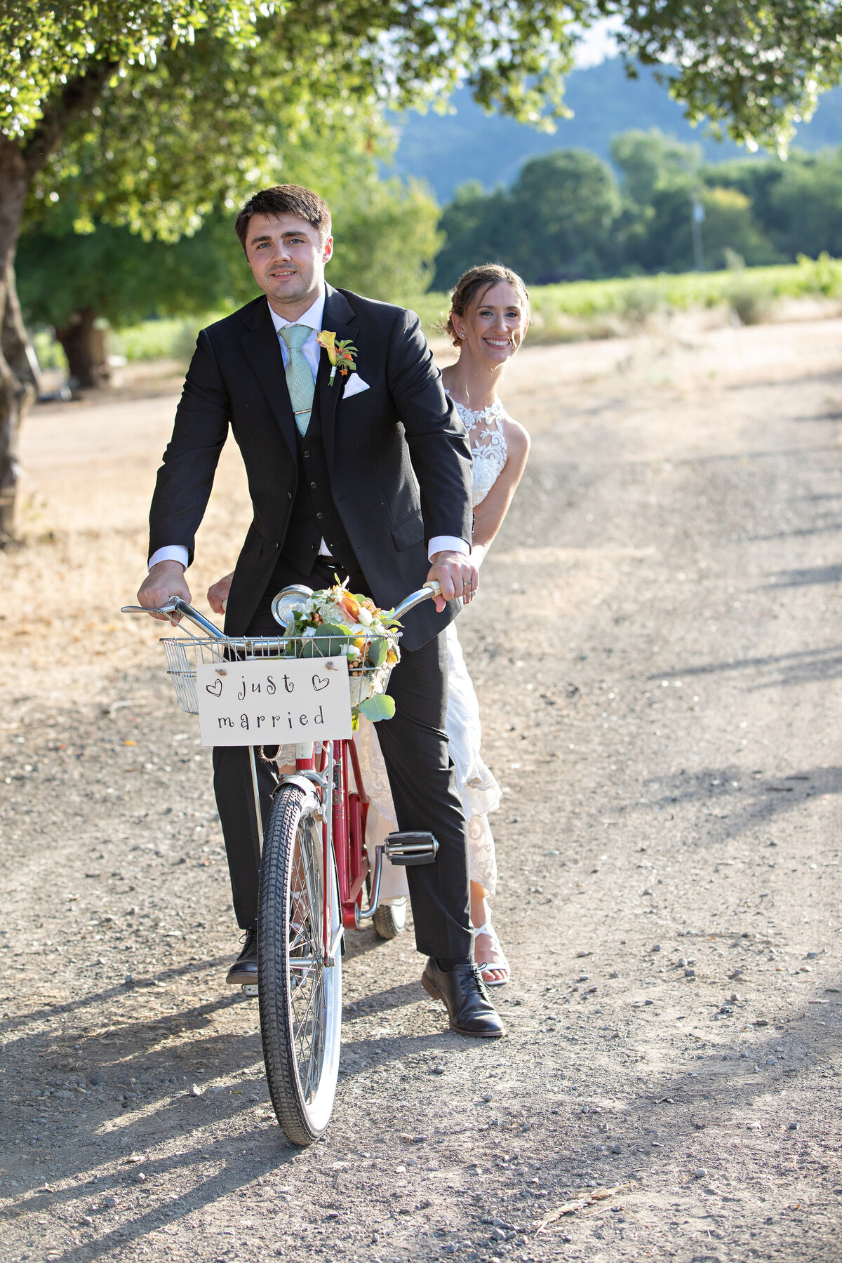 bride and groom on tandem