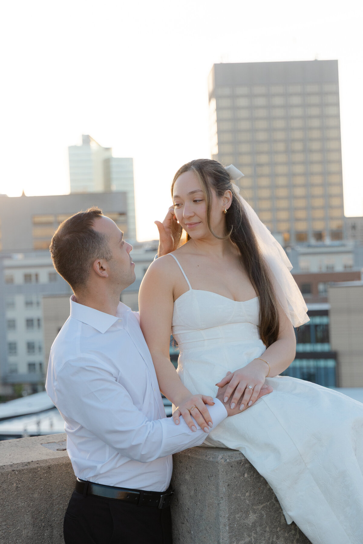 Worcester engagement photographer with a couple on the city rooftop, a timeless and editorial photoshoot in downtown Worcester. (arianna lyn photography, worcester wedding photographer)