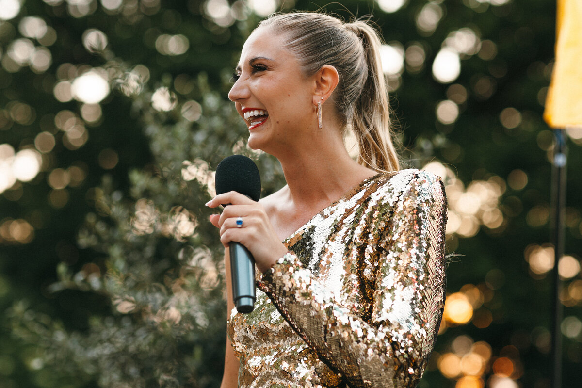 Bride wears gold sequined dress to her warm up party
