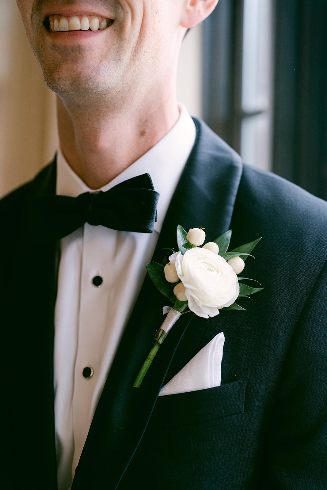 close up of groom shot by Philly-based photographer.
