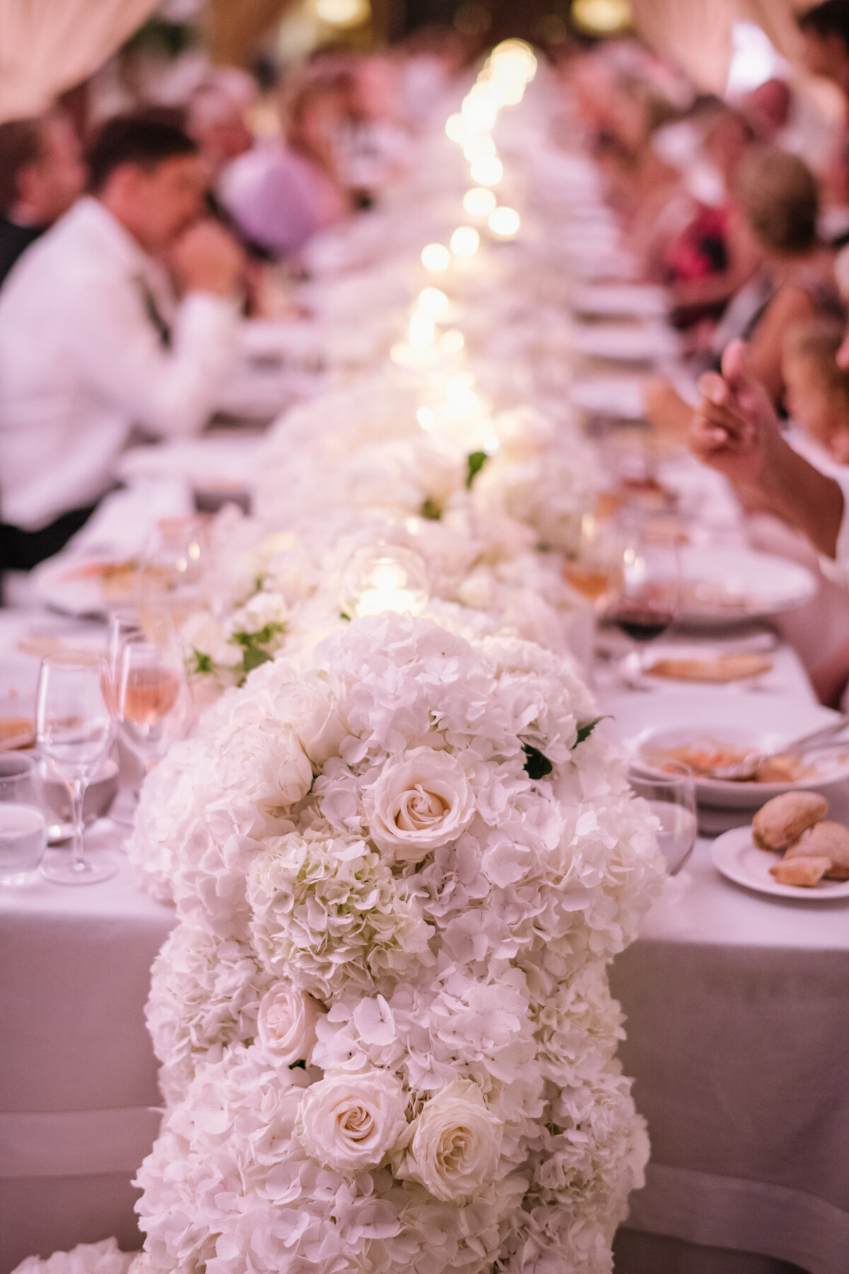 cap rocat wedding reception table with flower runner