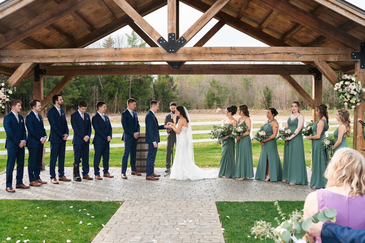 Extended family gathered for group wedding photos

