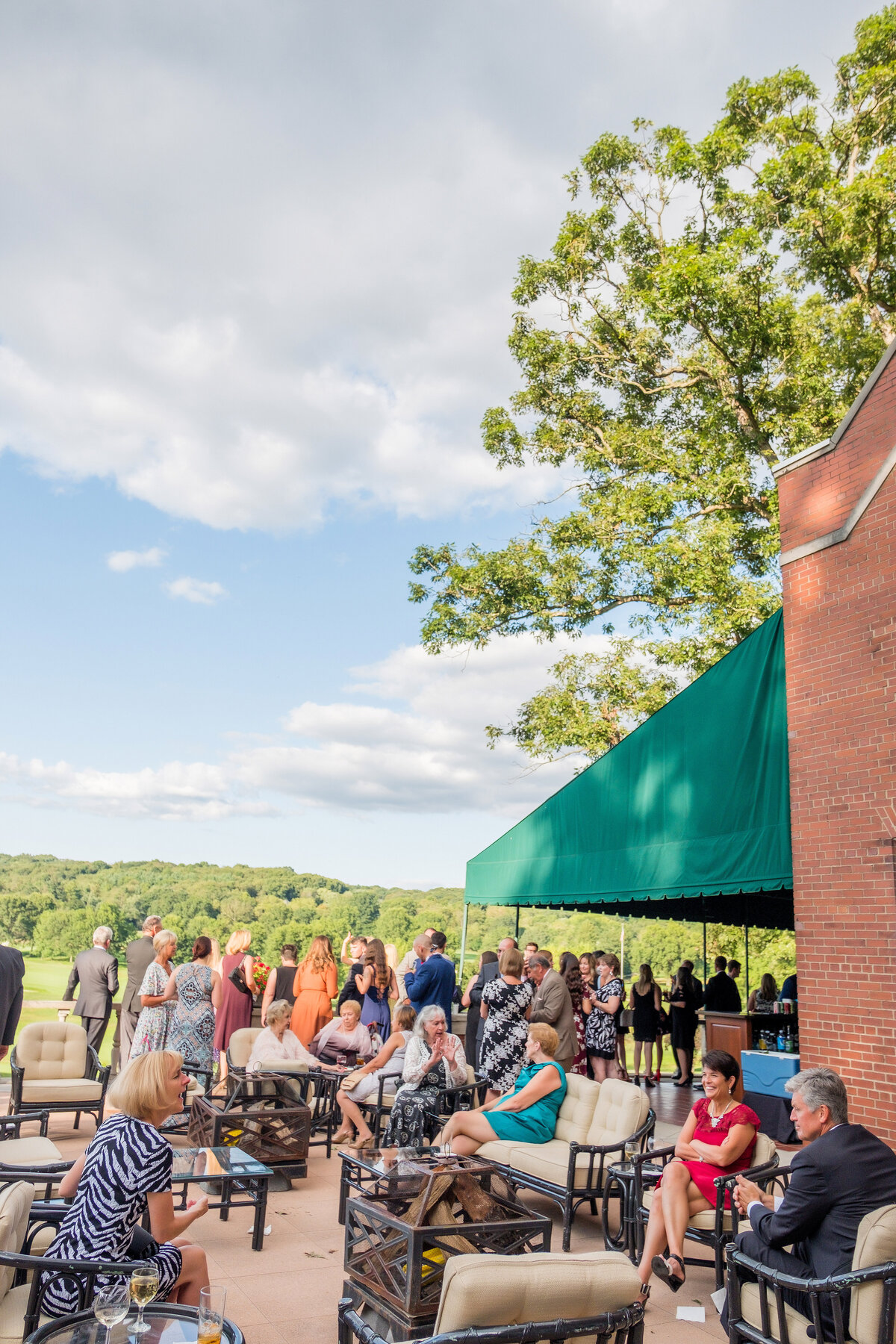 fox chapel golf club outdoor cocktail hour on the patio during a sunny day