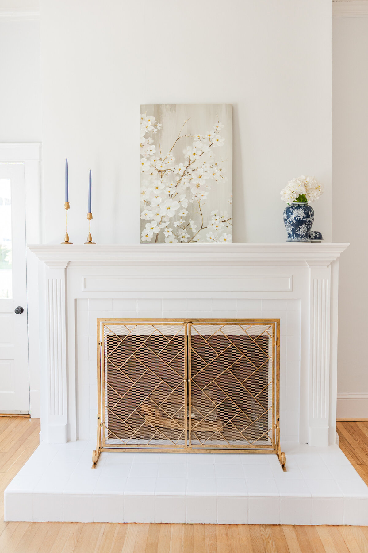 a white fireplace staged for photography sessions