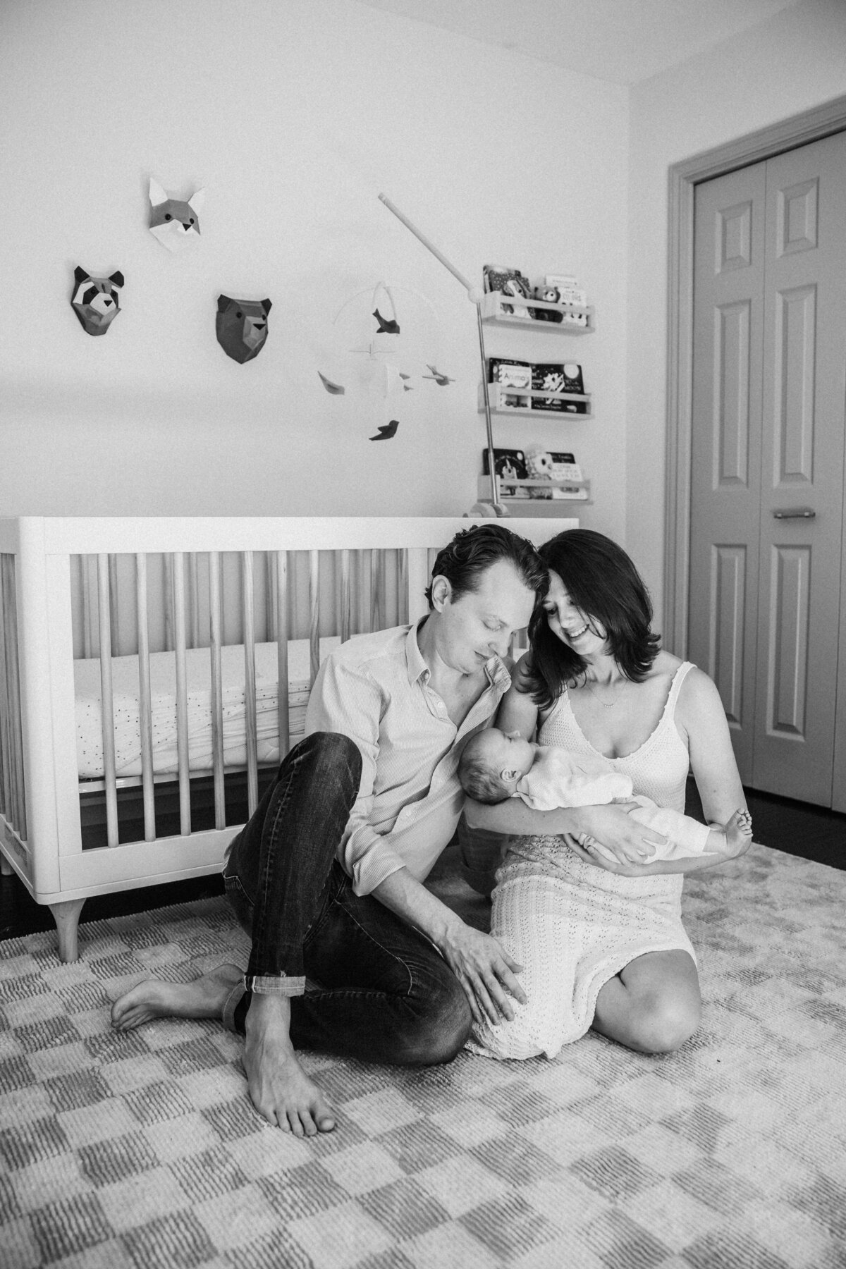 mom-and-dad-sit-in-nursery