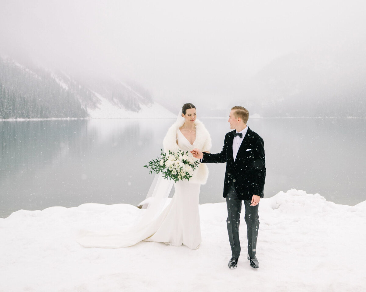 Winter wedding captured by Corrina Walker Photography, timeless and elegant wedding photographer in Calgary, Alberta. Featured on the Bronte Bride Vendor Guide.