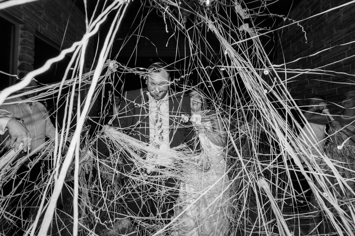 couple-tangled-up-in-streamers-grand-exit
