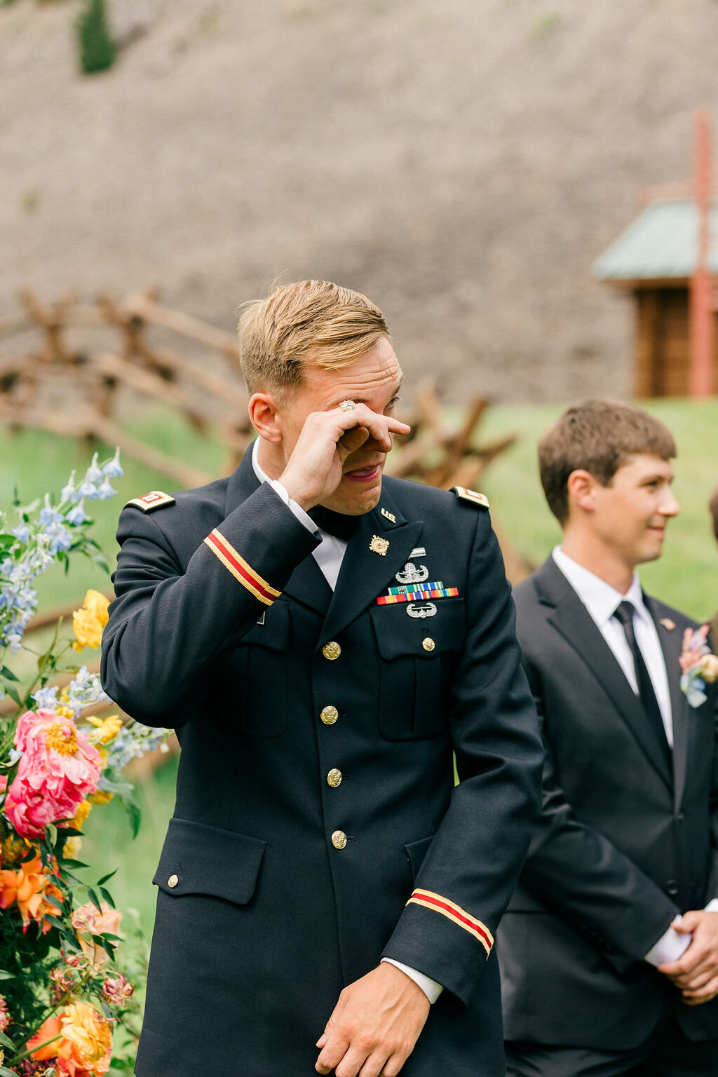 Groom as bride walks down the aisle