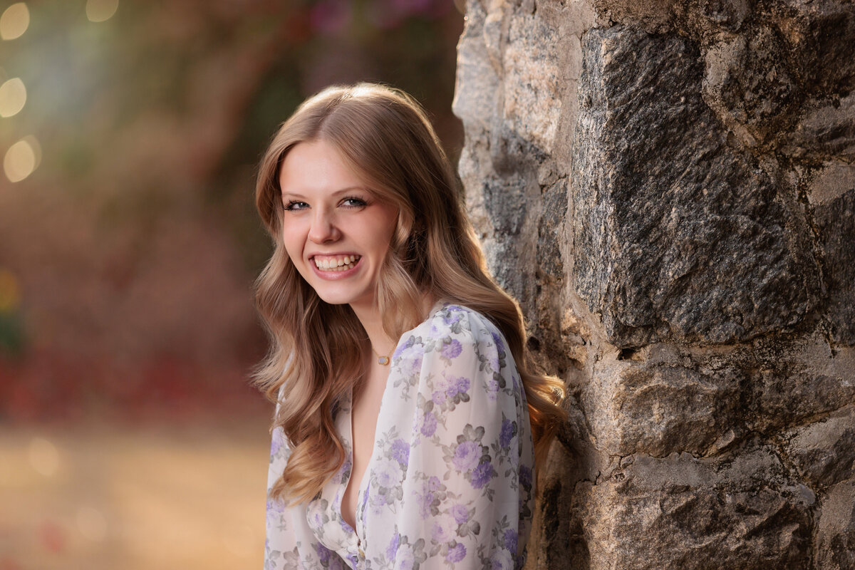 Raleigh senior laughing during pictures