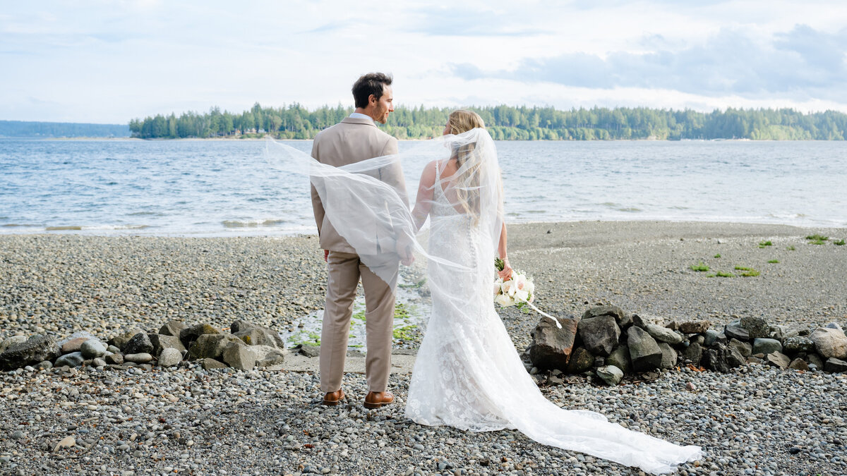 bride and groom beach wedding portrait on the Olympic Peninsula in the sand