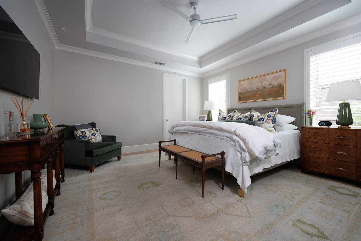 the keeping room interiors primera master bedroom with white bedding and large rug
