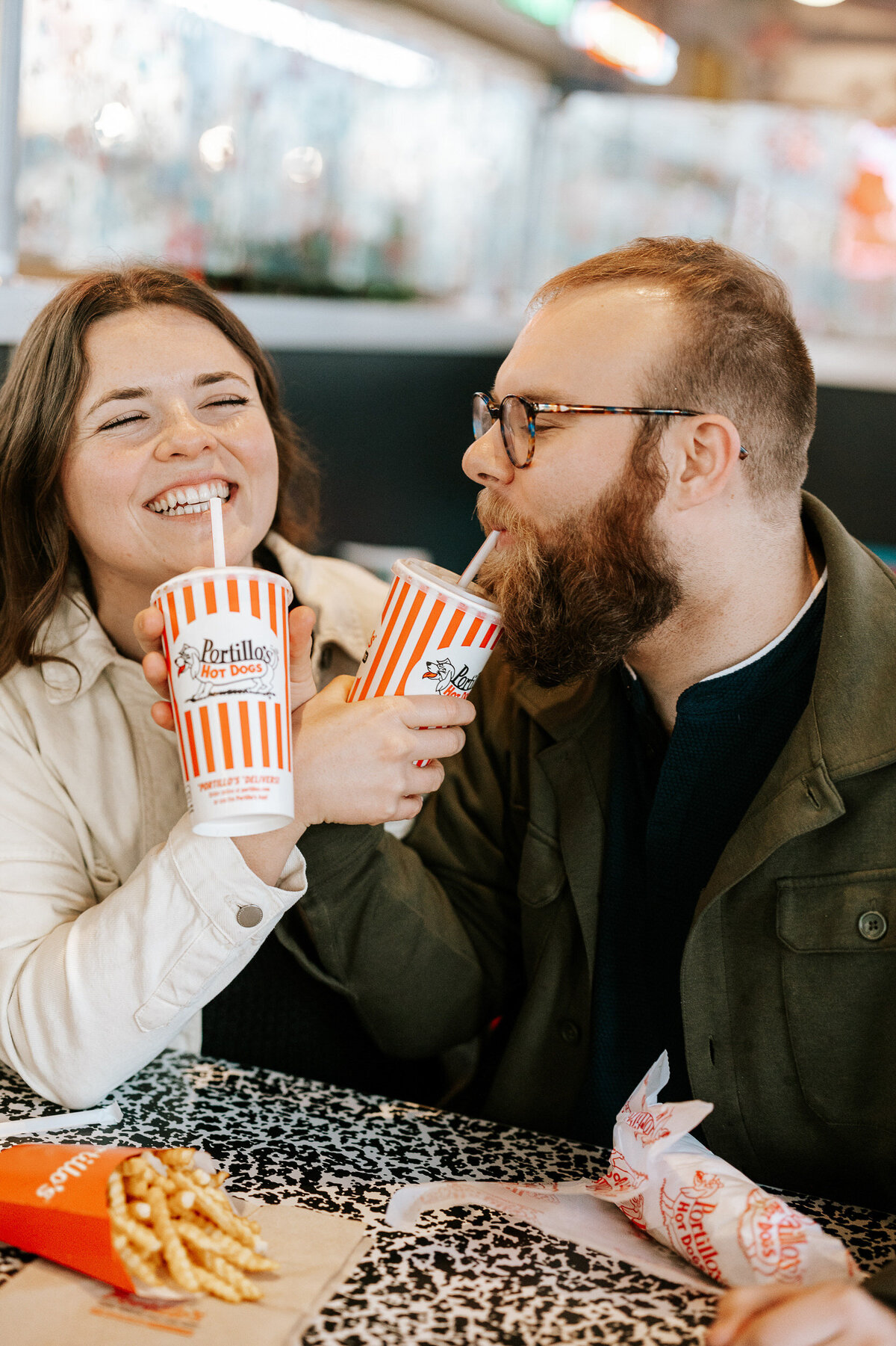 creative fun chicago flash engagement photos at Portillos Hotdogs-17-ed-lucy