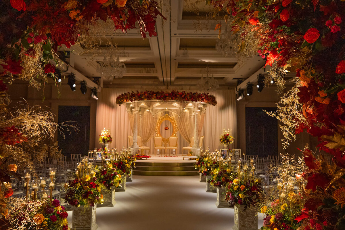 A dark and moody mandap at Fairmont Windsor