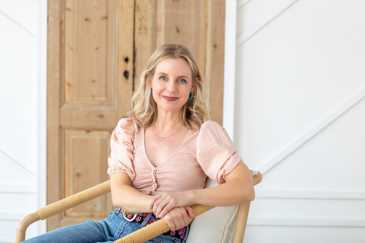 Philadelphia headshots session featuring a woman smiling naturally in a lifestyle pose