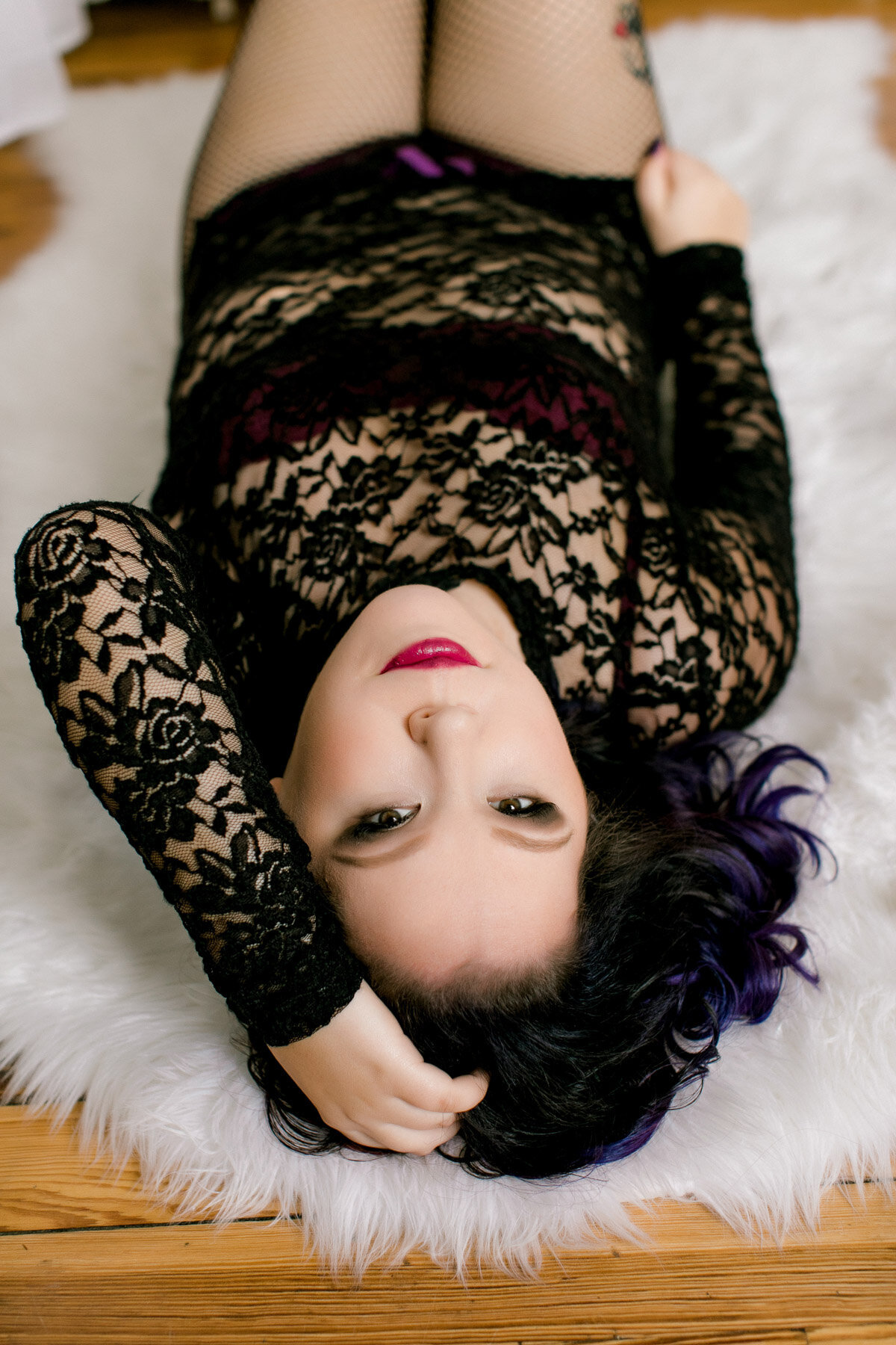 woman with purple hair in lace one piece