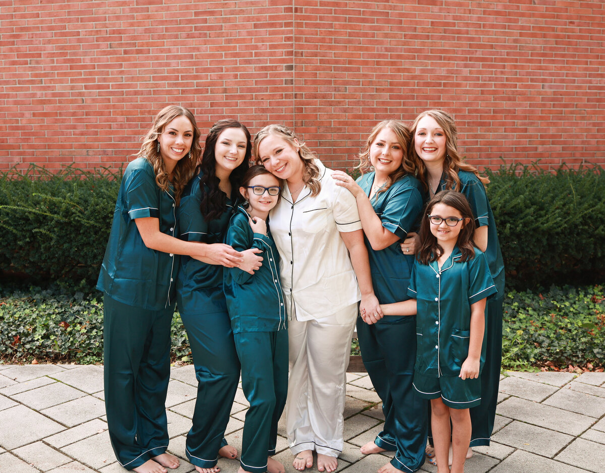 bride-and-bridesmaids-wearing-green-silk-pajamas-in-Louisville-Kentucky-by-Kentucky-Wedding-Photographer-Amanda-Richardson-Photography