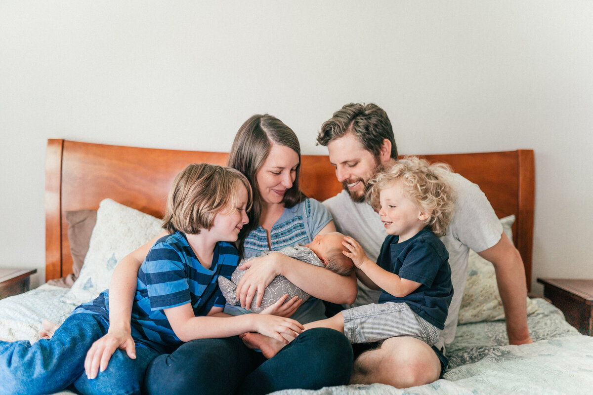 Indoor Family Photo on a bed in Austin Texas