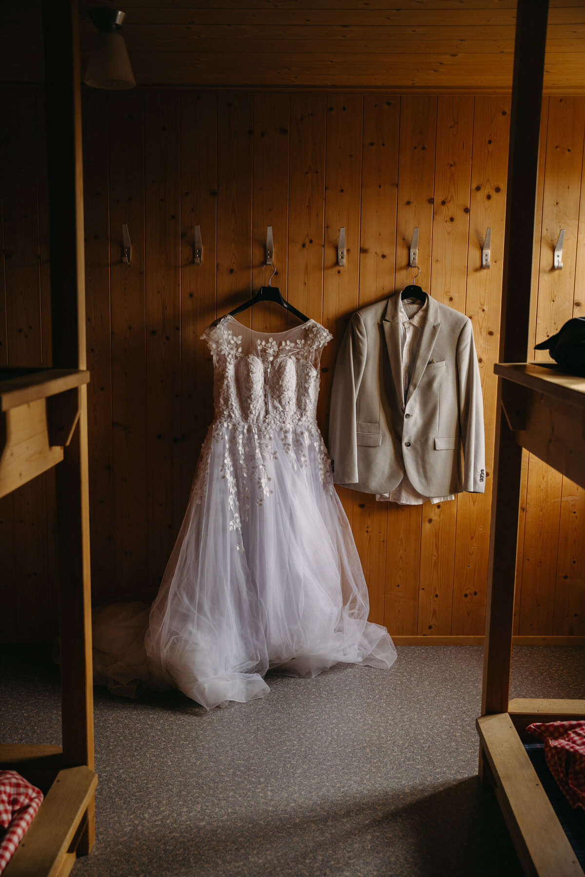 The dress and suit of the couple for their Switzerland elopement at the hut in Appenzell