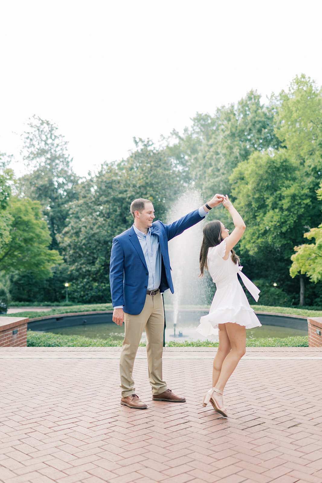 couple-dancing-for-engagement-photos