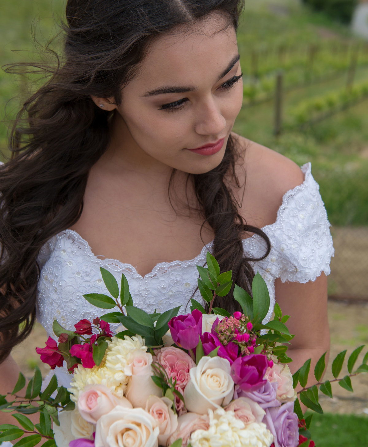 Neutral eye makeup and lots of lashes bright florals and a pink lip